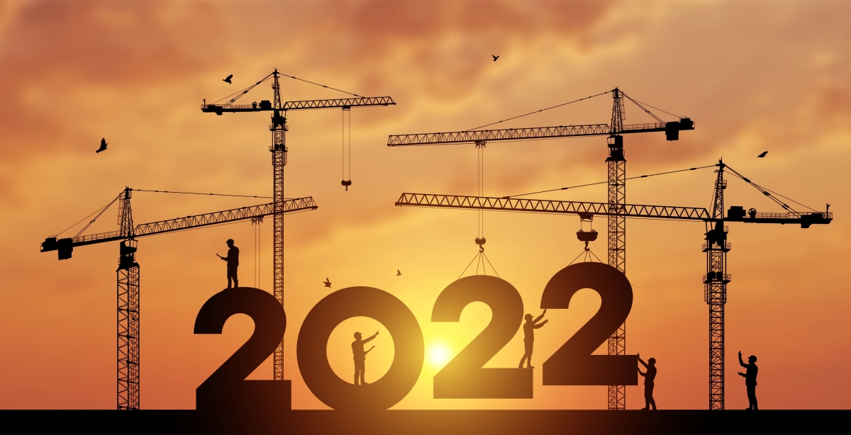 Immobilier - tout ce qui change en 2022 – Vue sur un chantier au levé du soleil avec les chiffres 2022