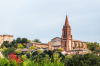 vente appartement jardin toulouse – vue de l’église d’un village près de Toulouse