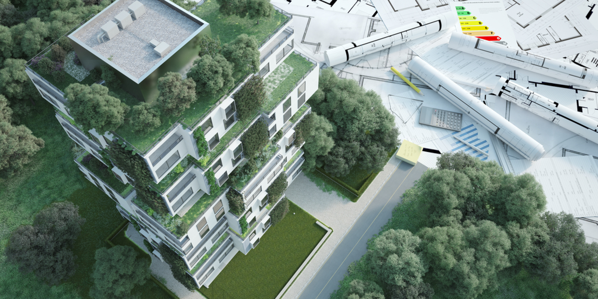 une maquette de green building et des plans d'architecte